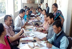 Officials checking documents related to land records etc at the Centralised OV cells that are being set up for Revenue departments at the premises of the DC Office Nagaon Dec, 2016.