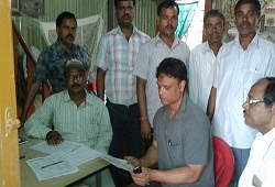 LRCR officer verifying documents at Tukrapara during the Field Verification visit that is currently going on at Goroimari Circle in Kamrup - Nov, 2015.