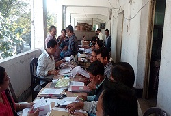 Officials checking documents related to land records etc at the Centralised OV cells that are being set up for Revenue departments at the premises of the DC Office Nagaon Dec, 2016.