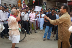 Public enjoys a street play (Bator Naat) on NRC Updation held at Palashbari Circle in Kamrup Rural