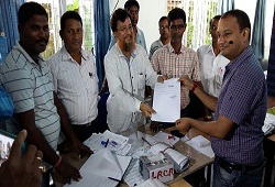 Shri Virendra Mittal, Deputy Commissioner, IAS of Sivasagar district receives his NRC Acknowledgement slip on 25th August, 2015.