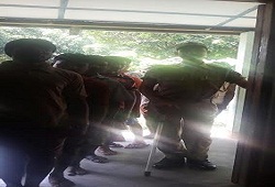 A still from Kokrajhar as jail inmates awaits their turn to fill up the NRC Application Form.