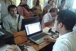 Veteran actor Nipon Goswami submitting his NRC Application Form in Guwahati recently.